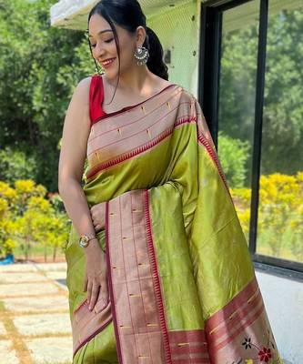 Green woven design zari silk blend paithani saree 2