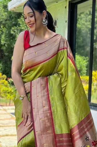 Green woven design zari silk blend paithani saree
