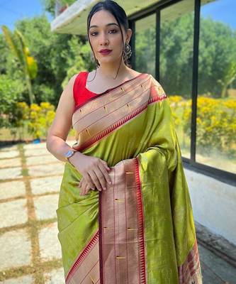 Green woven design zari silk blend paithani saree 3