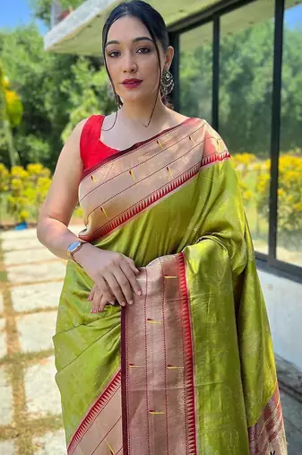 Green woven design zari silk blend paithani saree