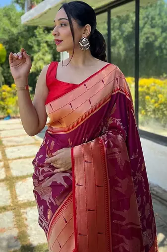 Magenta magenta ethnic motifs woven design zari paithani saree