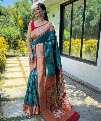 teal woven design zari silk blend paithani saree 1