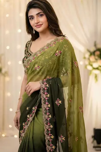green embellished embroidered poly georgette heavy work saree