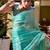 turquoise embellished sequinned poly chiffon saree