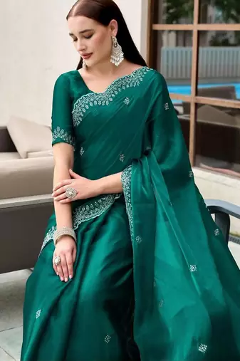teal woven design poly chiffon saree
