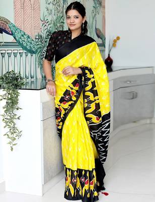 yellow ethnic motifs printed ikat saree 1