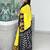 yellow ethnic motifs printed ikat saree