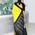 yellow ethnic motifs printed ikat saree