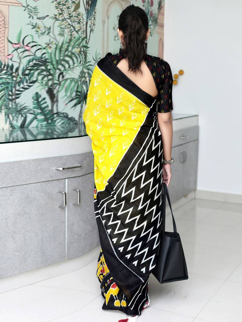 yellow ethnic motifs printed ikat saree