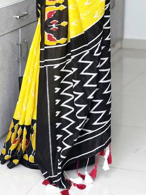 yellow ethnic motifs printed ikat saree 5