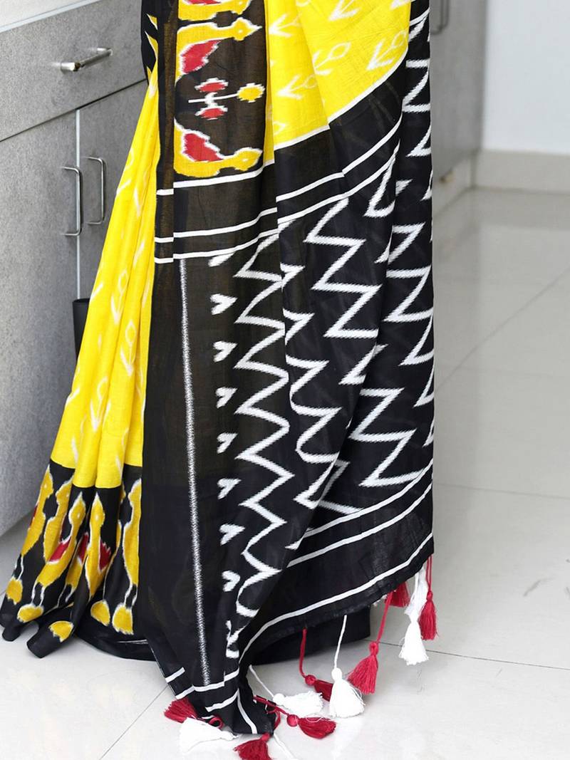 yellow ethnic motifs printed ikat saree