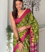 green abstract printed ikat saree