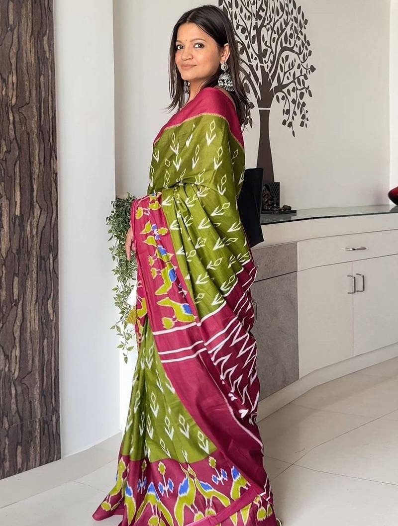 green abstract printed ikat saree