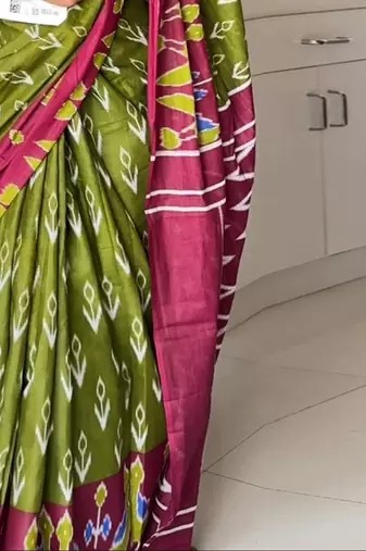 green abstract printed ikat saree