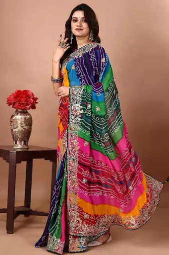 green embroidered bandhani saree