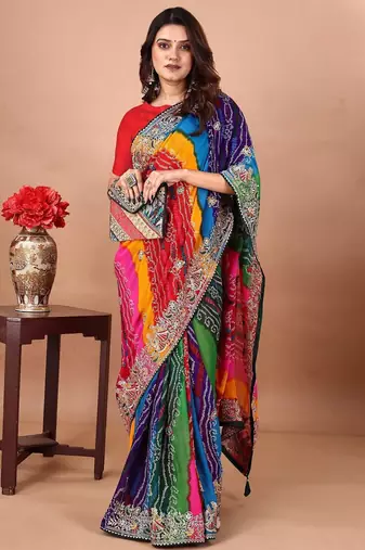 green embroidered bandhani saree