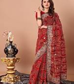 red women embroidered bandhani saree