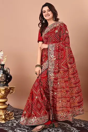 red women embroidered bandhani saree
