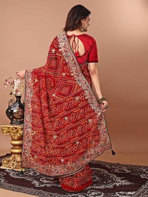 red women embroidered bandhani saree 3