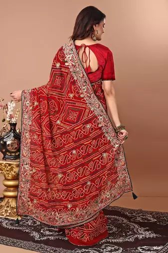 red women embroidered bandhani saree
