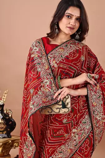 red women embroidered bandhani saree