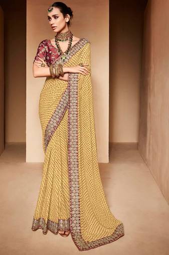 cream embroidered bandhani saree