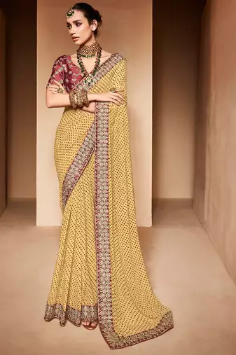 cream embroidered bandhani saree