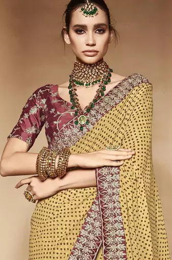 cream embroidered bandhani saree