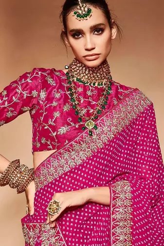 pink embroidered bandhani saree