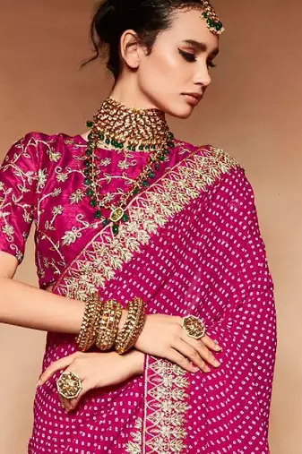 pink embroidered bandhani saree