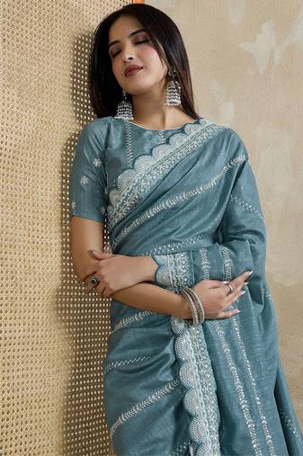 teal ethnic motifs embroidered silk blend saree