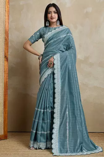 teal ethnic motifs embroidered silk blend saree