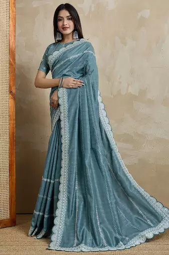 teal ethnic motifs embroidered silk blend saree
