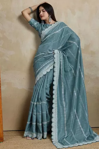 teal ethnic motifs embroidered silk blend saree
