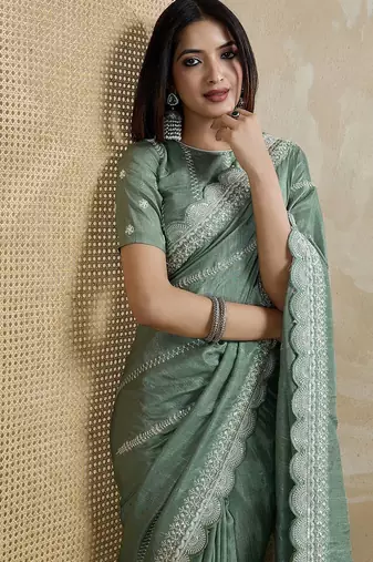 green ethnic motifs embroidered saree