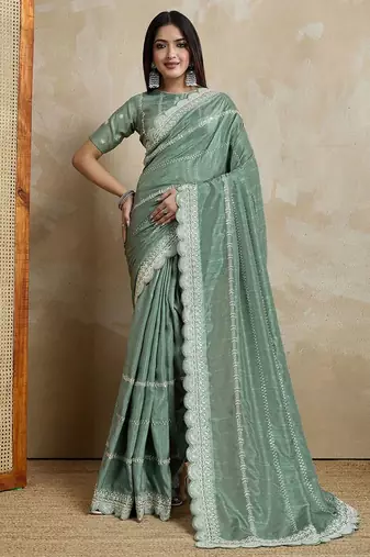 green ethnic motifs embroidered saree