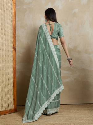 green ethnic motifs embroidered saree 4
