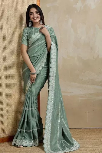 green ethnic motifs embroidered saree