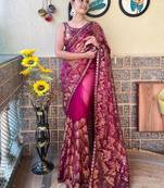 magenta embellished sequinned net saree with blouse piece