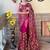 magenta embellished sequinned net saree with blouse piece
