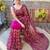 magenta embellished sequinned net saree with blouse piece