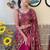 magenta embellished sequinned net saree with blouse piece