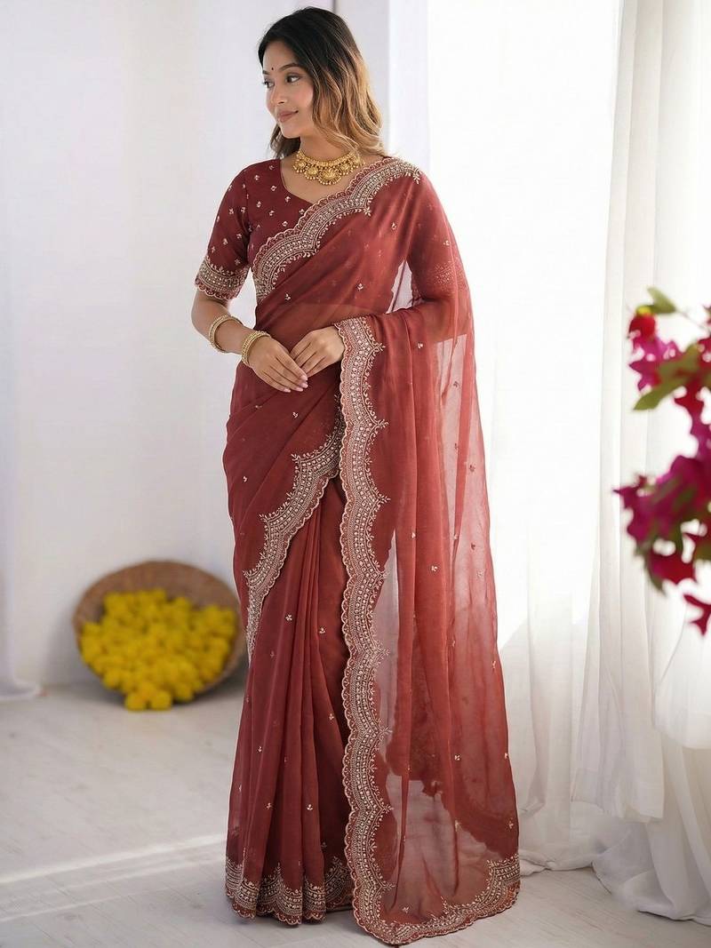 maroon embellished beads and stones poly georgette heavy work saree