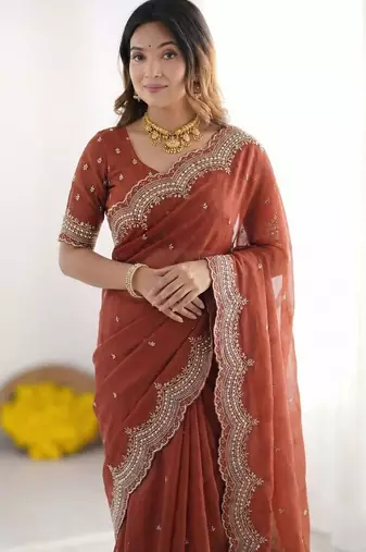 maroon embellished beads and stones poly georgette heavy work saree