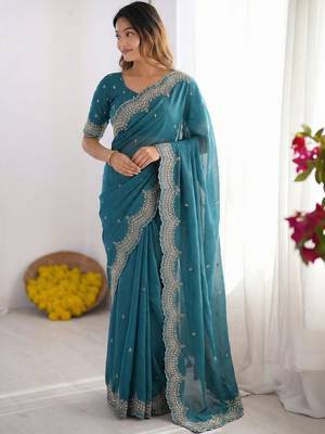 teal embellished embroidered poly georgette heavy work saree 1