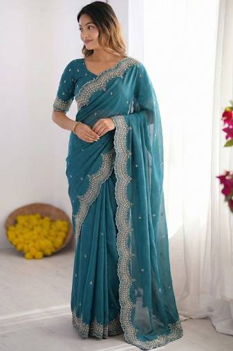 teal embellished embroidered poly georgette heavy work saree