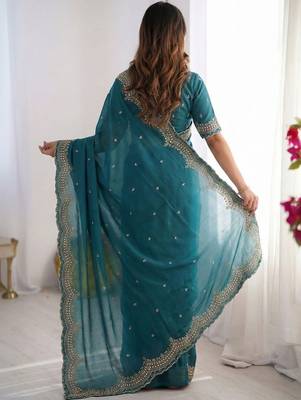 teal embellished embroidered poly georgette heavy work saree 2
