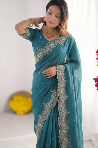 teal embellished embroidered poly georgette heavy work saree