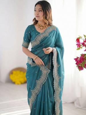 teal embellished embroidered poly georgette heavy work saree 5