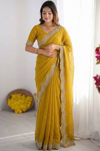 yellow embellished beads and stones poly georgette heavy work saree